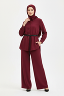 Hijabi model in burgundy set