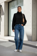 RIVA Knit Blouse in Black - model outdoor with jeans