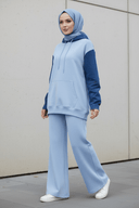 Blue pullover set - hijabi concrete wall
