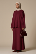 Burgundy knit set on a hijabi model
