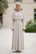 Creamy Beige Élise Knit Dress on an outdoor hijabi model