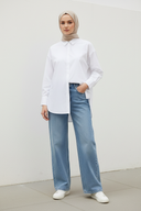 Hijabi - plain white outdoor wall