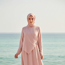 Lebanese hijabi model in blush pink dress