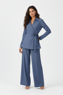 Model in slate blue set - white background