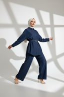 White studio with geometric shadow